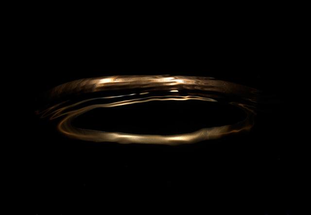 Underwater Gold Halo Reflecting Light & Movement In Water With Light Causics